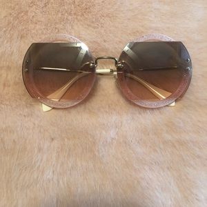 Miu miu round sunglasses